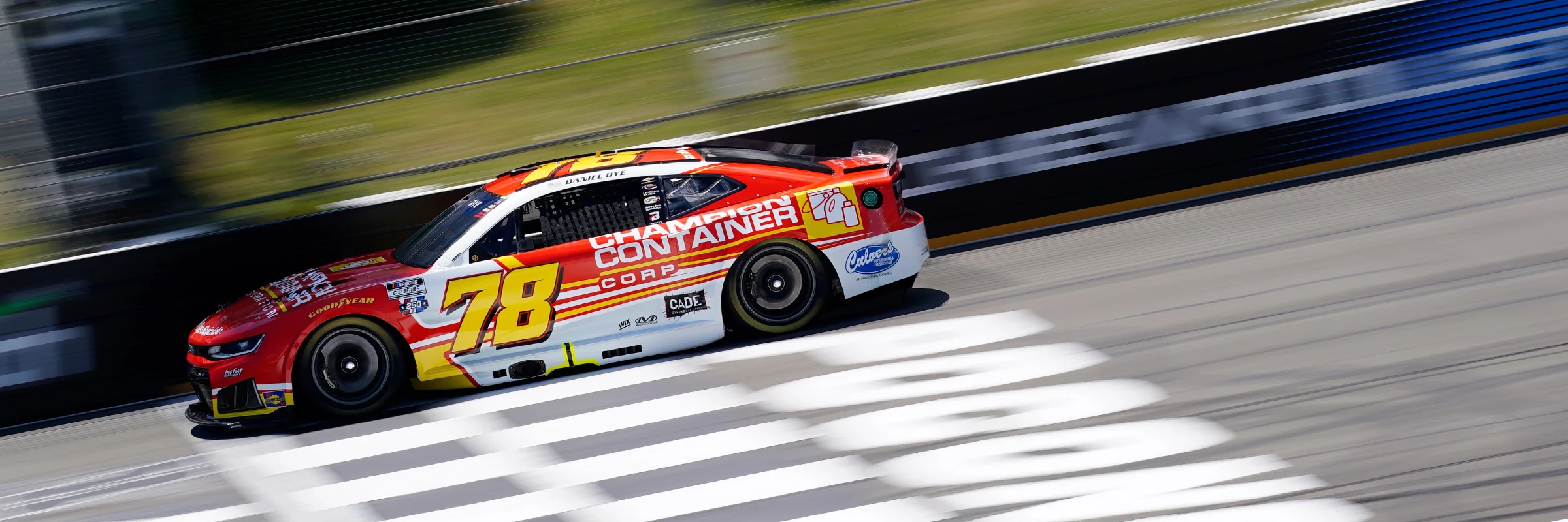No. 78 Champion Container Cup car crossing the line at Pocono